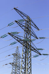 Austria, Upper Austria, View of High voltage towers against sky - EJWF000214