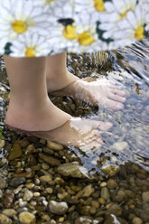 Germany, Bavaria, Landshut, Girl standing in water, close up - SAR000063