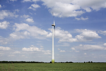 Germany, Brandenburg, wind turbines in green field - CNF000013