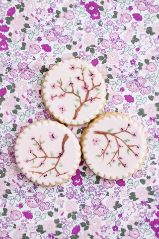 Painted pink sugar cookies, close up stock photo