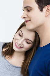 Germany, Bavaria, Munich, Young couple with eyes closed, smiling - SPOF000445