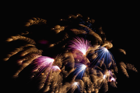 Germany, North Rhine Westphalia, Duesseldorf, Fireworks exploding in sky stock photo