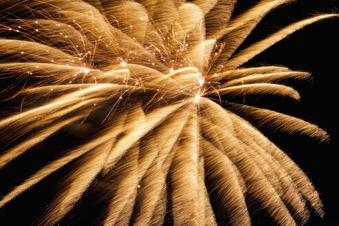 Germany, North Rhine Westphalia, Duesseldorf, Fireworks exploding in sky - KJF000239