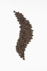 Coffee beans forming aroma symbol on white background - ASF005074