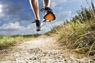 Germany, Bavaria, Mature Man jogging - MAEF007137