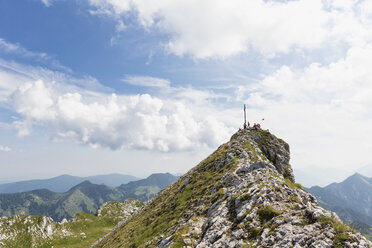 Germany, Bavaria, Ammergau Alps, View of hiker on ridge walk to Ammergauer Hochplatte - FO005146