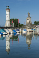 Germany, Bavaria, View of Port of Lindau with lighthouse and lion statue - ELF000364