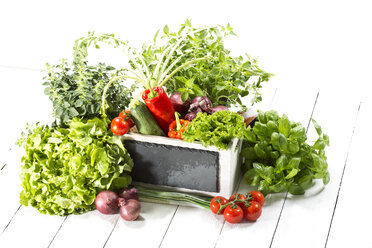 Variety of fresh vegetables in wooden box, close up - MAEF007175