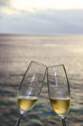 Champagne flute against beach - KRP000006