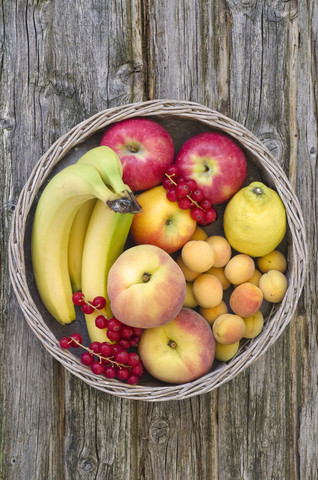 Basket filled with fruits, close up stock photo