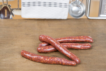 Germany, Freiburg, Sausages on chopping board, close up - DRF000102