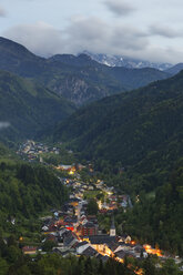 Austria, Carinthia, View of Bad Eisenkappel village near mountains - SIE004247