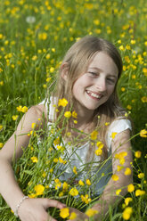 Germany, Bavaria, Portrait of girl smiling - CRF002463