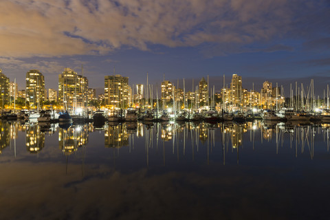 Canada, Vancouver, Marina with ships and skyline at night stock photo