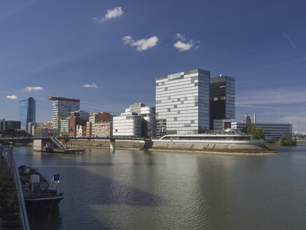 Germany, North Rhine Westphalia, Duesseldorf, View of Media harbour buildings - HHEF000054