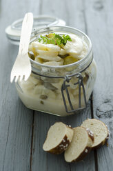Potato salad in preserving jar with sliced pretzel sticks - ODF000377