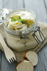 Potato salad in preserving jar with sliced pretzel sticks - ODF000376