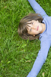 Germany, Baden-Wuerttemberg, Tuebingen, girl lying on meadow - LVF000200