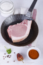 Raw pork chop with spices - ODF000417