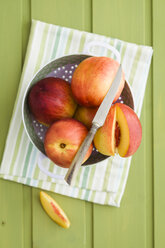 Peaches in strainer, close-up - ECF000326