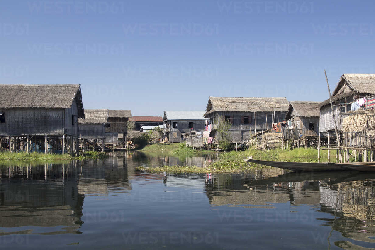 Aerial view of people working on a floating platform for fishing