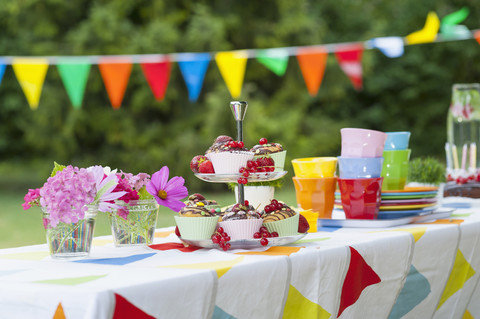Table in garden on a birthday party stock photo