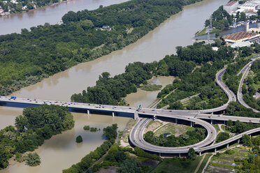 Germany, Hesse, View of motorway bridge near Wiesbaden at high water of River Rhine, aerial photo - CSF019978