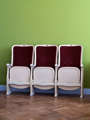 Germany, Berlin, seats of a cinema in a flat - BSCF000379