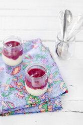 Semolina porridge with raspberry puree in glasses - CZF000088