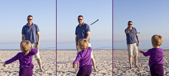 Dänemark, Ringkoebing, kleines Mädchen mit ihrem Vater beim Spielen am Strand - JFEF000216