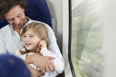 Father and daughter in a train - KFF000229