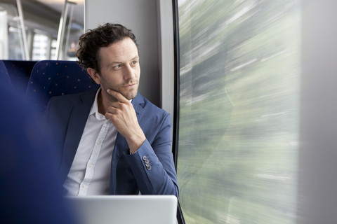 Businessman in a train stock photo