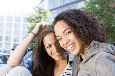 Germany, Berlin, Young women in the city - FKF000257