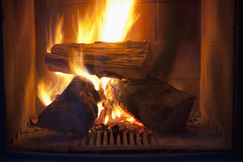 Fire in a fireplace stock photo