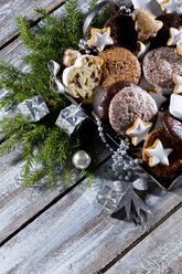 Christmas cookies, Christmas stollen and ginger bread on a metal tray, studio shot - MAEF007296