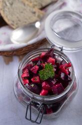 Beetroot salad in a preserving jar with olive bread - ODF000532