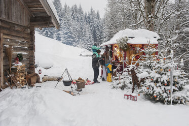 Austria, Altenmarkt, family at Christmas market - HHF004642