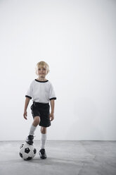 Boy in soccer jersey with ball - PDF000465