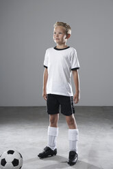 Boy in soccer jersey with ball - PDF000488