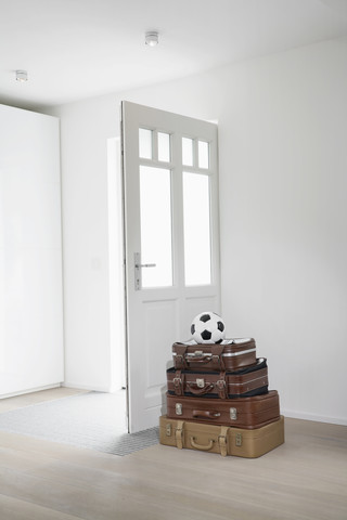 Germany, Cologne, Luggage in empty room stock photo