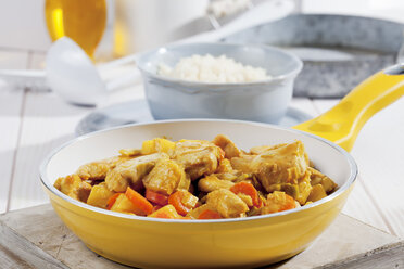 Chicken curry in yellow pan, close up - CSF020226