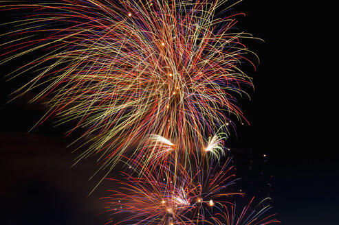 Fireworks exploding in the sky at night - KJF000266