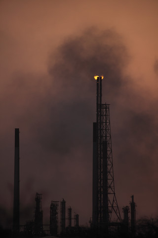 Curacao, Willemstad, Old oil refinery at dusk stock photo