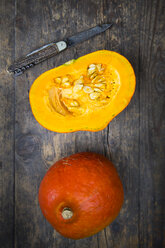 Hokkaido pumpkin on wooden table - LVF000265