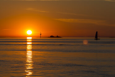 Germany, Bremerhaven, Weser, sailing boat at sunset - SJF000067