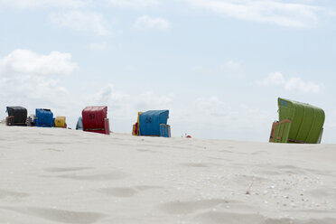 Germany, Amrum, Beach chairs in beach - AWDF000729