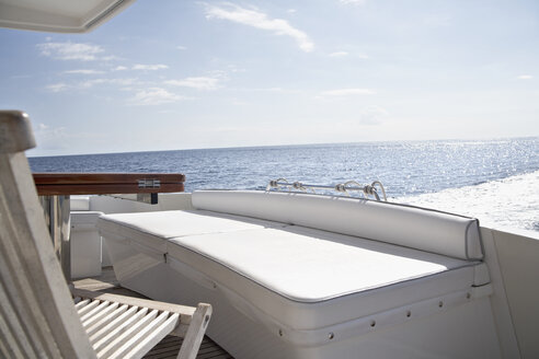 Italy, Sardinia, Chair on yacht deck - PDF000581