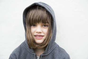 Portrait of smiling little girl with hoodie jacket - LVF000314