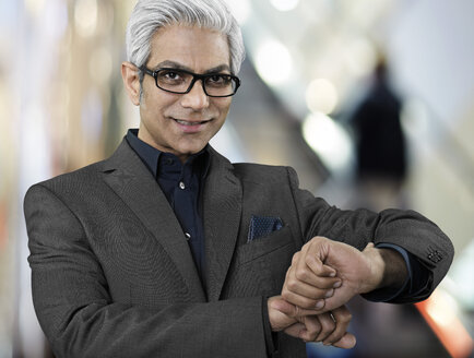 Portrait of waiting business man - STKF000536