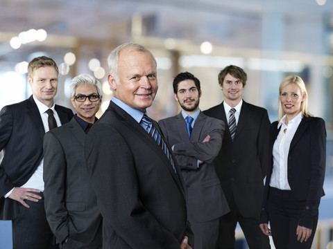 Group of six successful business partners stock photo